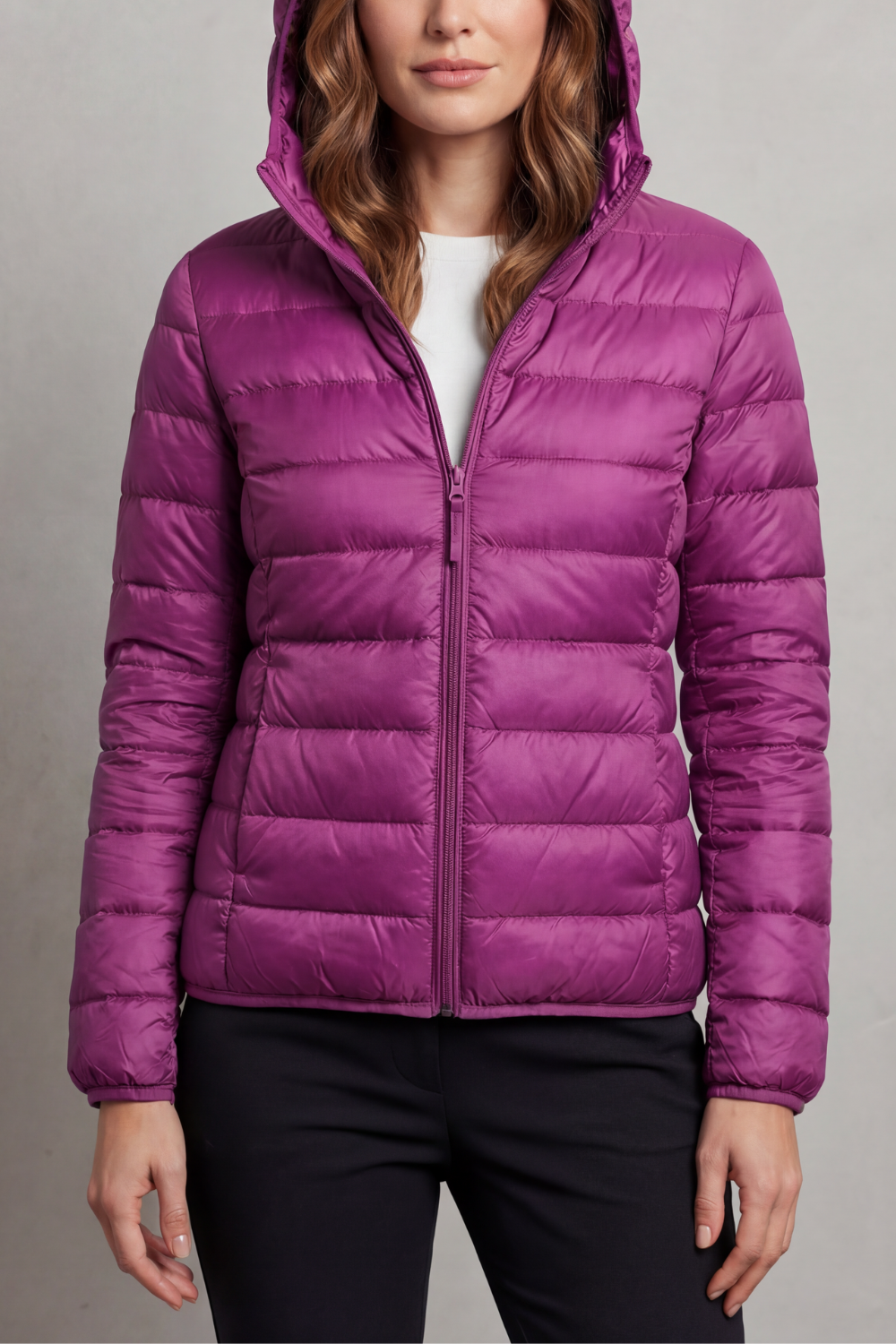 Cozy women's ultralight hooded puffer, ideal outerwear for fall & winter trips.