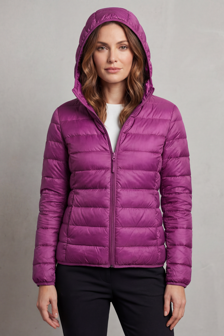 Women's packable winter jacket, ultralight hooded puffer for warmth & convenience.