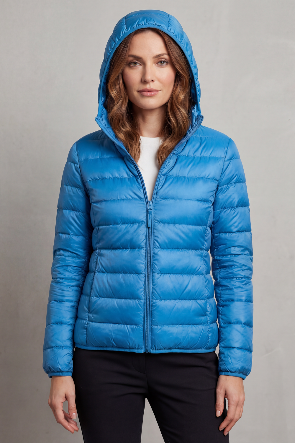 Durable women's ultralight packable puffer, hooded jacket for winter and fall style.