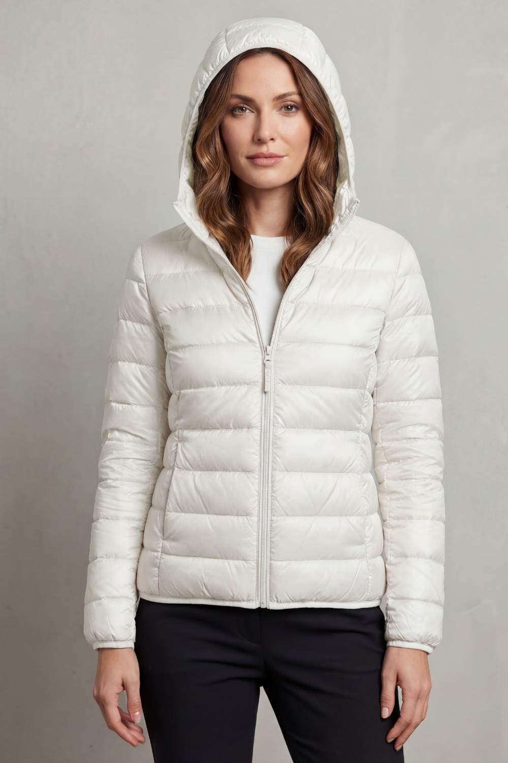 Women's ultralight packable hooded puffer coat, perfect for winter and travel.