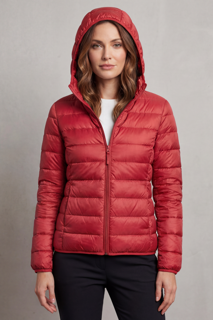 Women's fall/winter ultralight packable puffer, hooded for ultimate convenience.