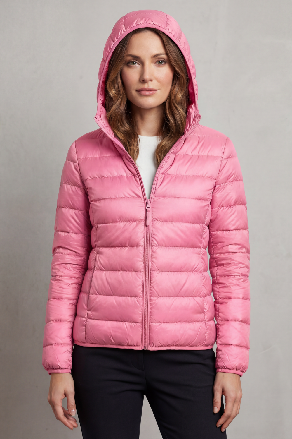 Fashion-forward women's hooded puffer, ultralight & packable for chilly weather.