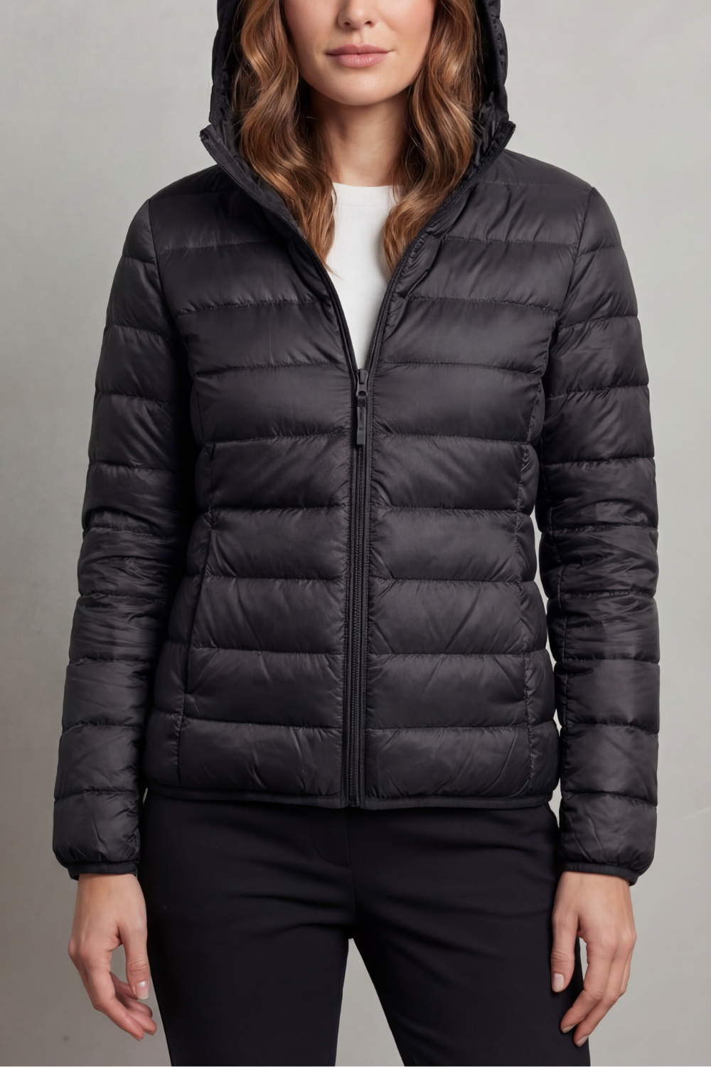 Packable women's puffer coat with hood, ultralight design for fall and winter warmth.