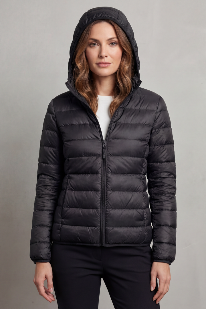 Versatile women's ultralight hooded puffer jacket, perfect for cold weather layering.