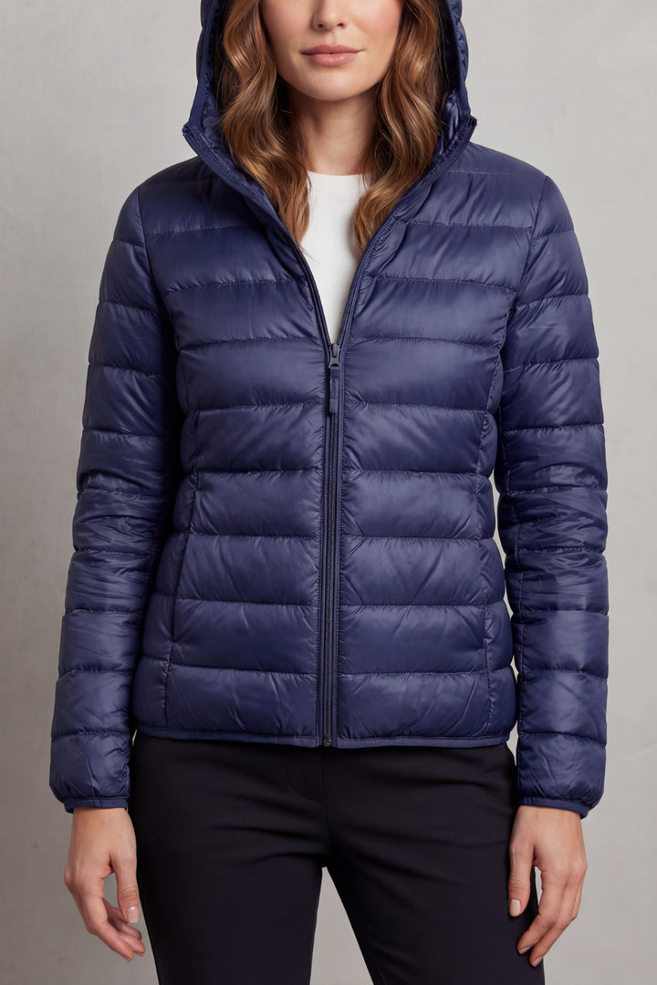 Women's stylish hooded puffer, ultralight & packable outerwear for year-round comfort.