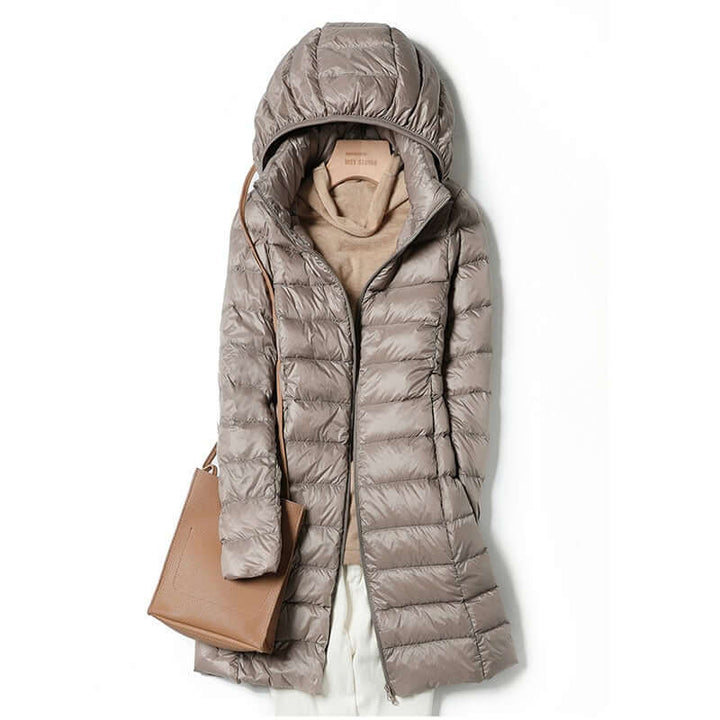 Lightweight women's zip-up winter jacket. Perfect leisure coat for travel, offering warmth without the bulk.