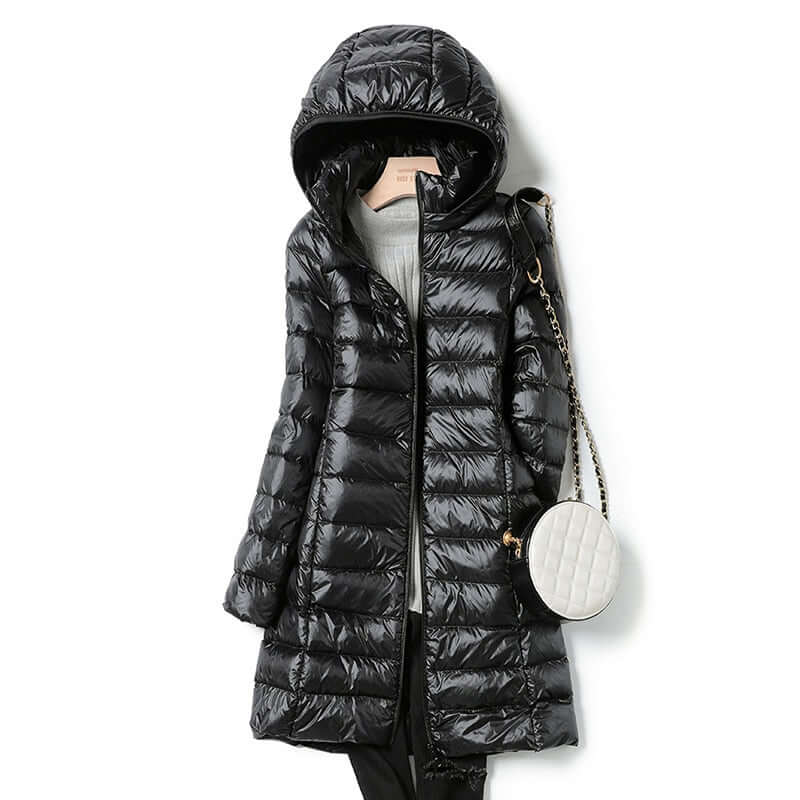 Ladies' casual ultralight jacket. This warm winter outerwear is excellent for everyday cold weather style.
