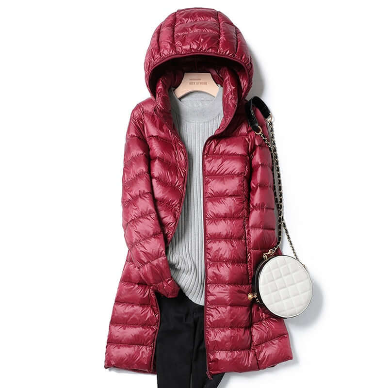 Modern women's ultralight winter jacket. This warm, casual coat is perfect for cold weather and travel ease.