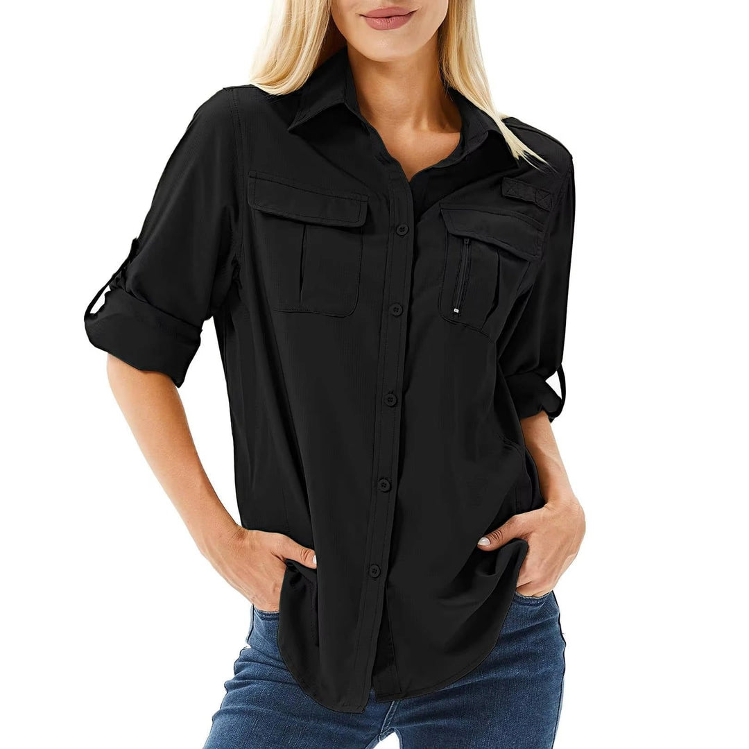 Stylish women's UPF 50 travel shirt with roll-up sleeves, offering sun protection for activewear.