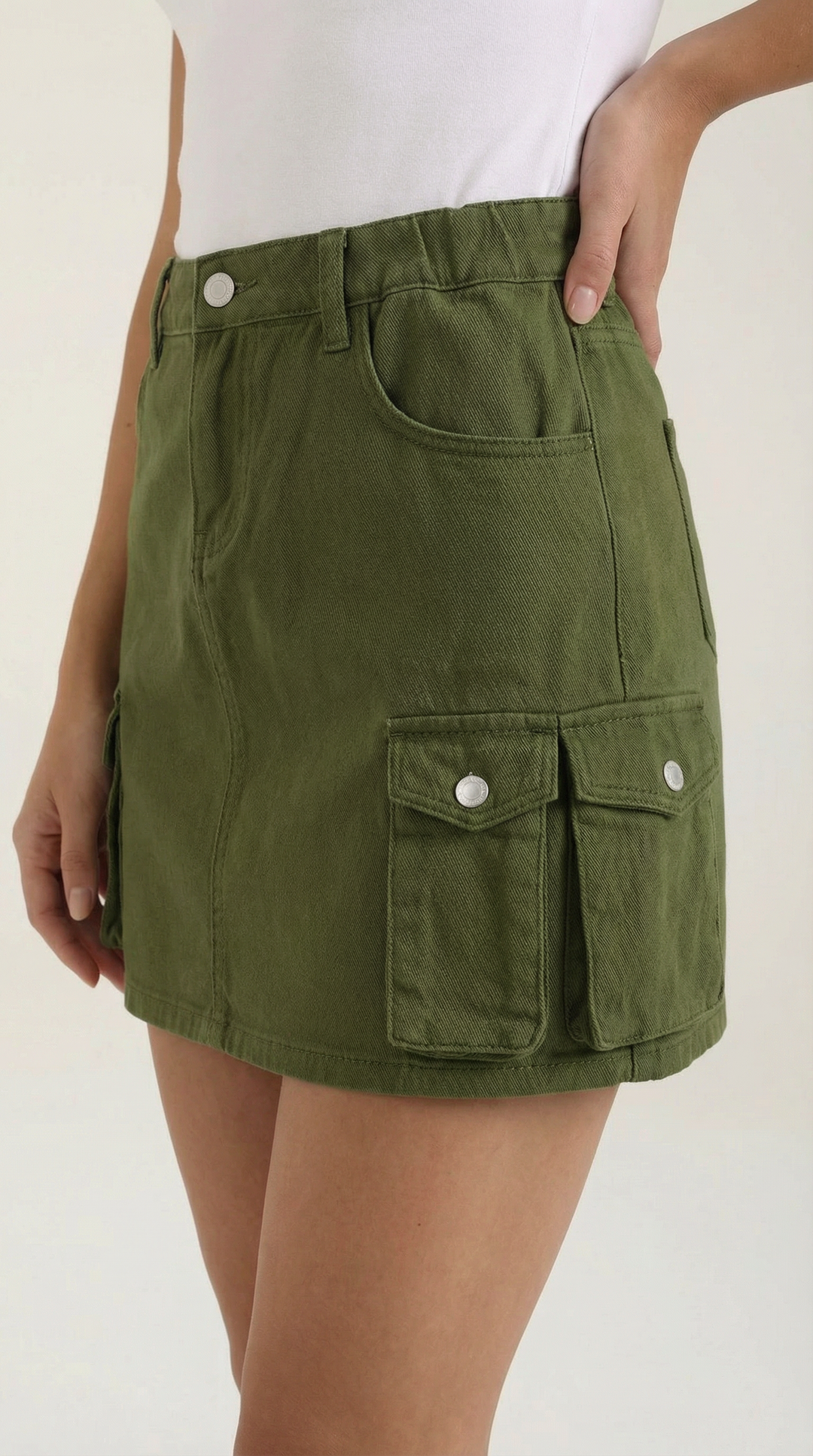 Women's utility cargo A-line mini skirt, ideal for a trendy urban summer style.