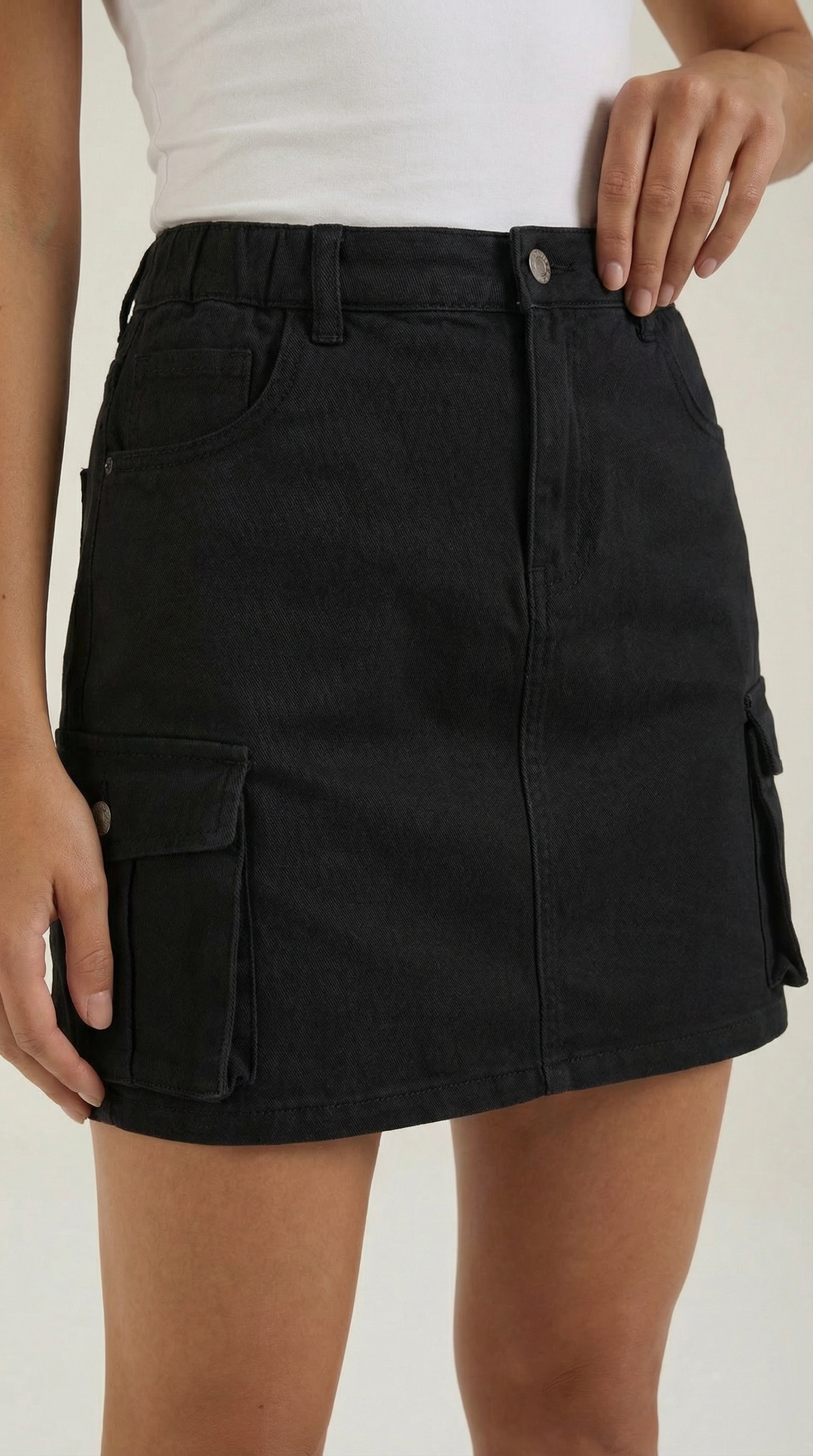 Women's casual A-line mini skirt with utility cargo pockets, a streetwear staple.