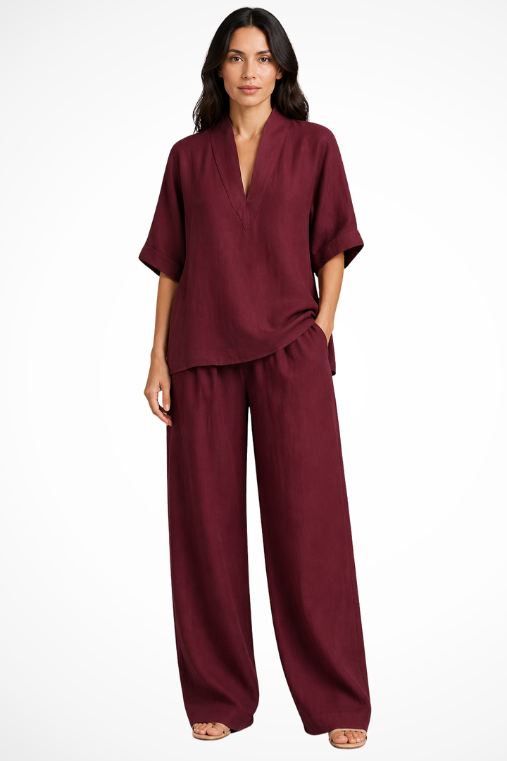 Two-piece women's fashion: V-neck top & wide leg trousers. Perfect for a breezy summer outfit.