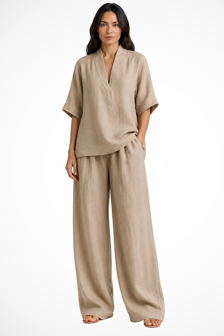 Versatile women's co-ord set: V-neck top & elegant wide leg trousers. Great for day or evening wear.