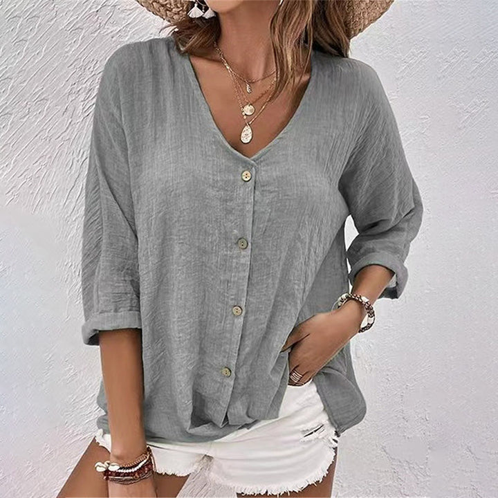 Versatile women's V-neck 3/4 sleeve blouse. An essential casual top for stylish spring, summer, and everyday wear.