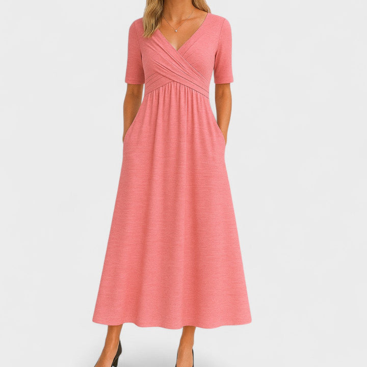 Comfortable women's V-neck A-line midi dress with pockets. Its flattering fit makes it a perfect casual & everyday dress.