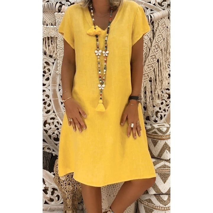 Flattering A-Line Mini Dress for women, V-neck, short sleeves. Great for casual summer events.