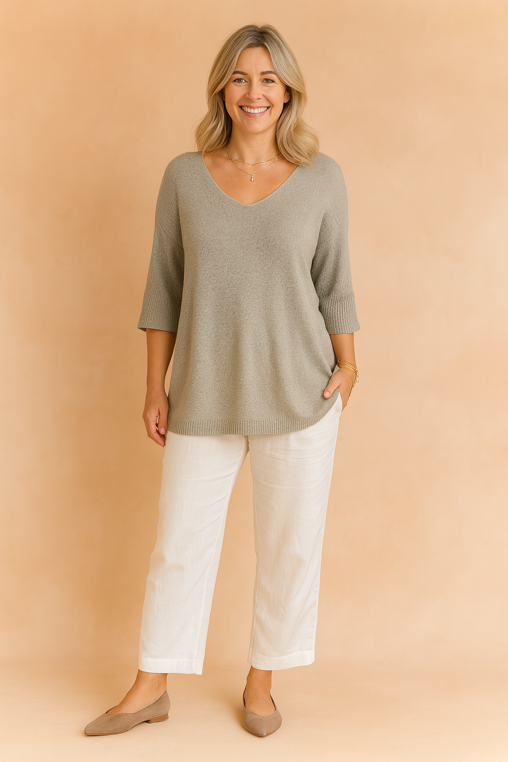 Versatile women's V-neck blouse in a relaxed fit. Comfortable 3/4 sleeve top for effortless everyday & casual wear.