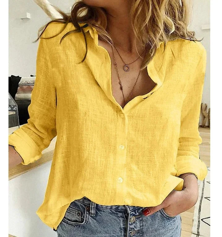 Versatile women's V-neck blouse, button-down, relaxed fit. Ideal for a chic casual top.