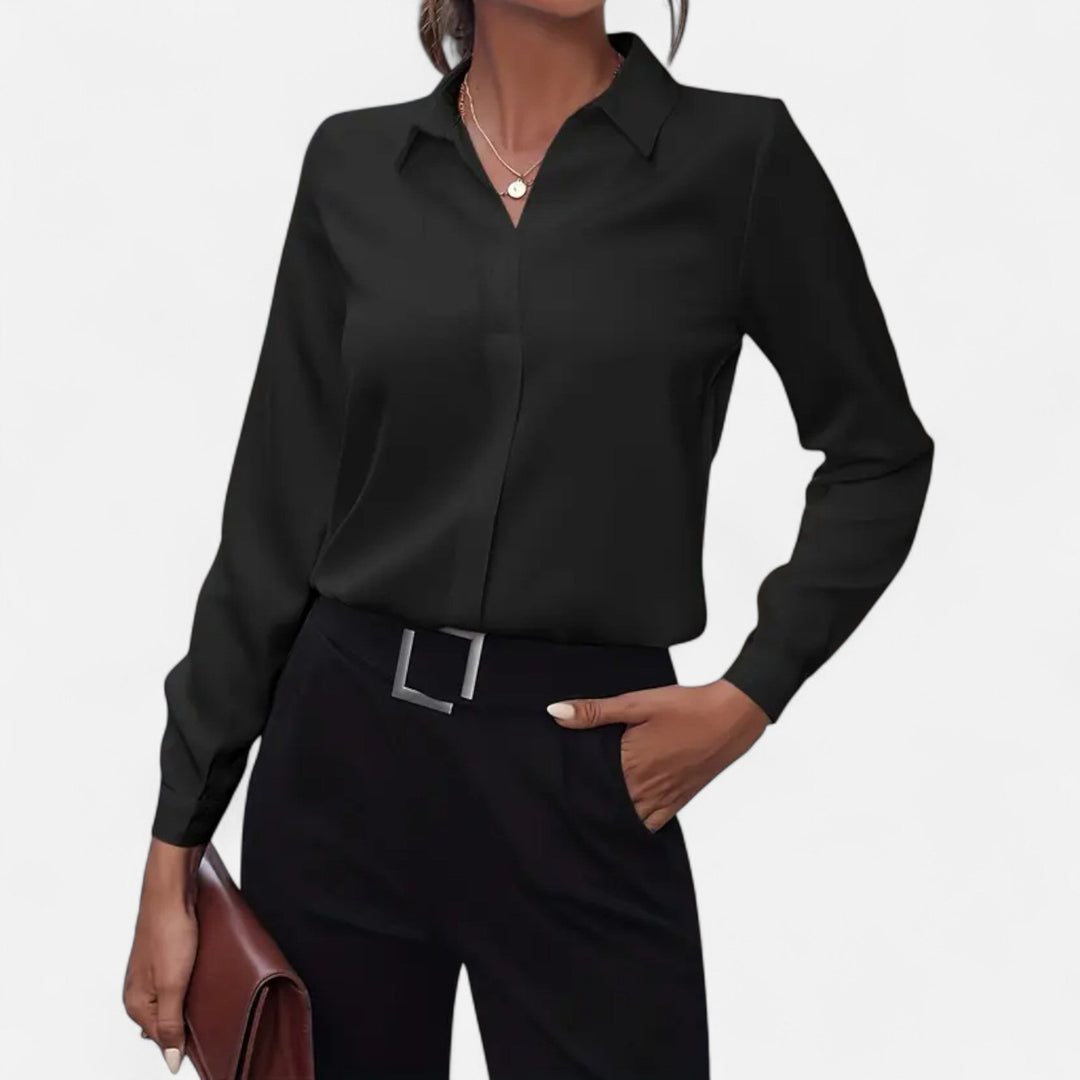 Women's V-neck button-up blouse, elegant long-sleeve top for professional or casual wear.