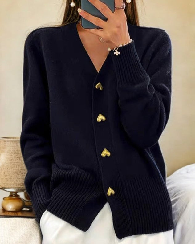 Stylish women's V-neck cardigan. Cozy ribbed knit sweater with charming heart buttons. Great for casual & elegant outfits.