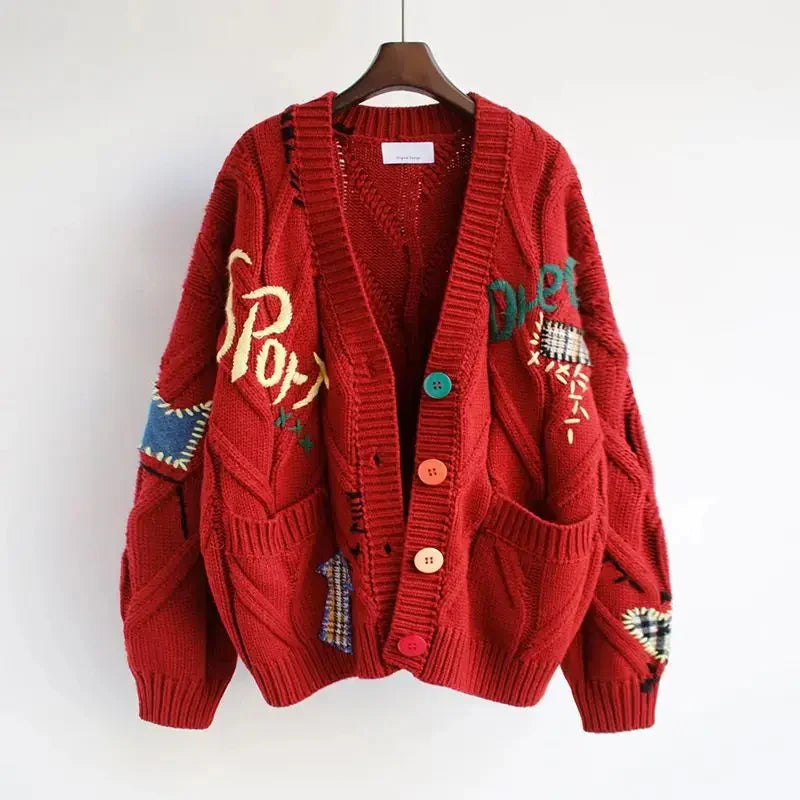 Elegant women's V-neck cardigan showcasing vibrant patchwork and detailed embroidery. A stylish spring layering piece.