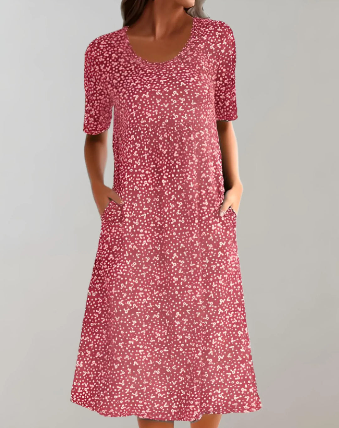 Comfortable, effortless women's V-neck sundress with a flowy, relaxed fit, perfect for summer days.
