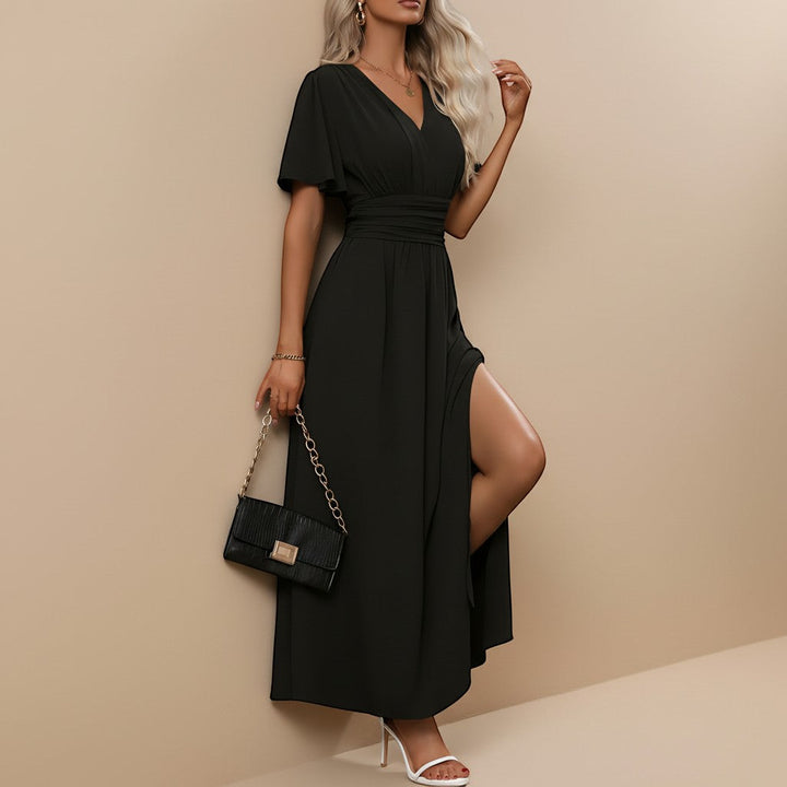 Flowy V-neck maxi dress for women, featuring stylish flutter sleeves.