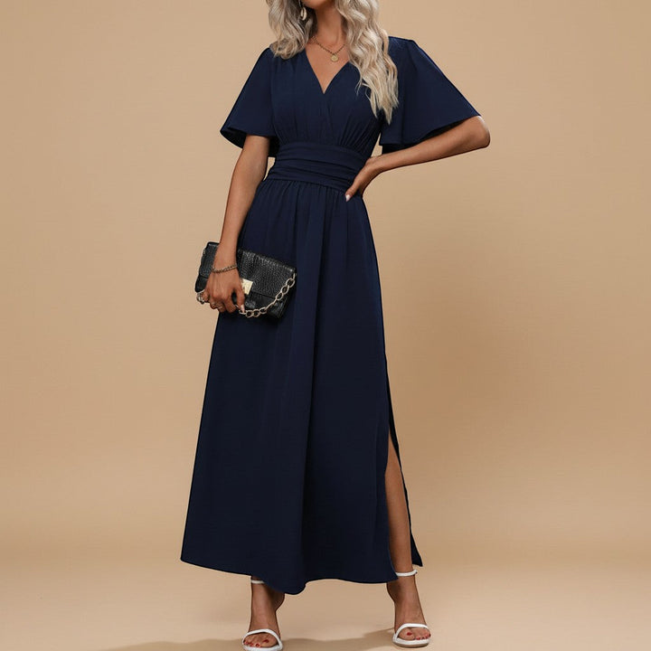 Flattering women's V-neck maxi dress with a defined waist and elegant flutter sleeves.