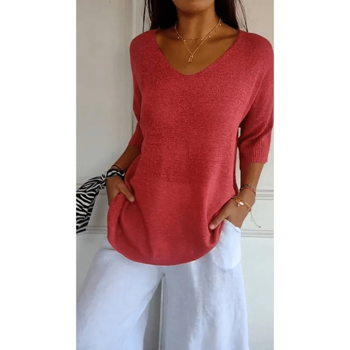 Women's V-neck linen blouse with 3/4 sleeves. Relaxed fit top for versatile casual & office wear.