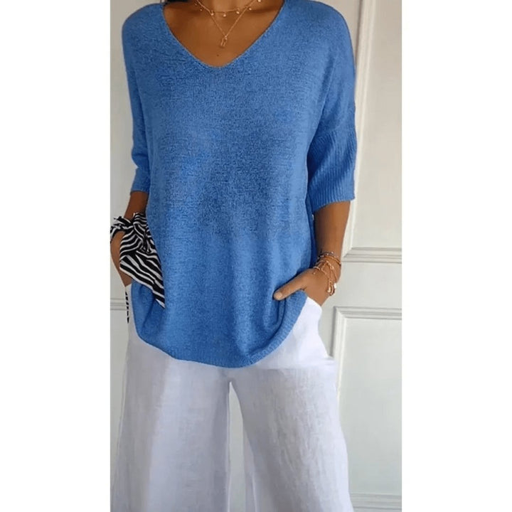 Chic women's V-neck linen blouse featuring 3/4 sleeves. Perfect for spring, summer, casual & office.
