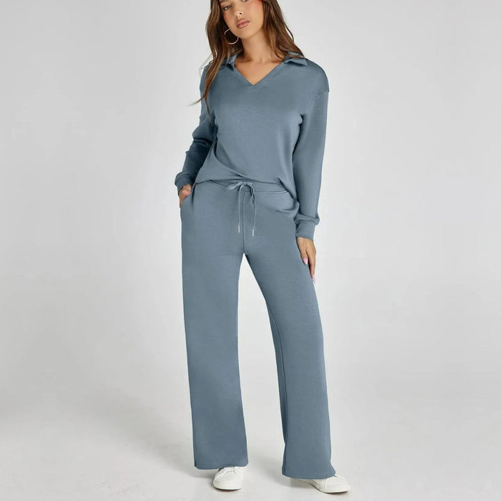 Women's V-neck long sleeve loungewear set with wide leg trousers. Comfortable two-piece home wear.