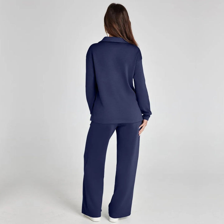 Modern women's V-neck long sleeve home wear set. Includes matching wide leg trousers for comfort.