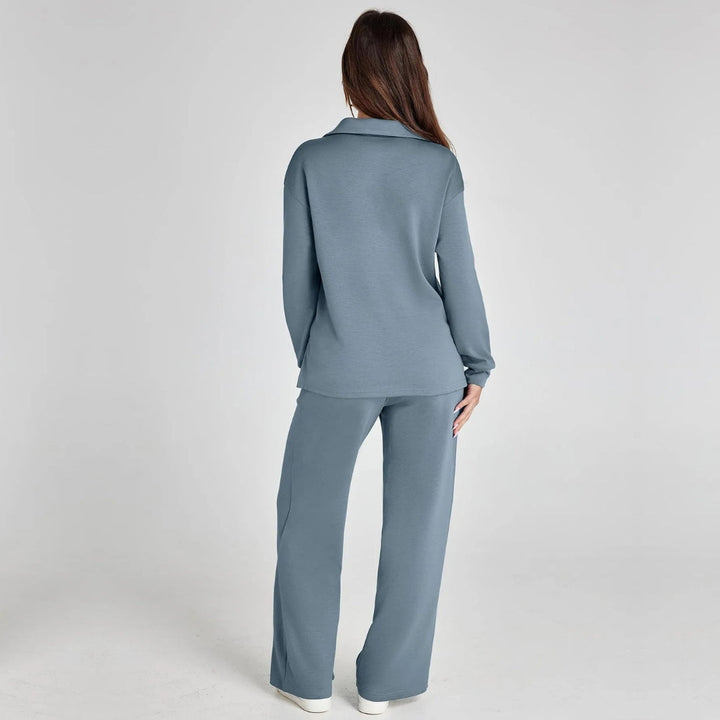 Stylish women's V-neck long sleeve top & wide leg trousers matching set for ultimate comfort.