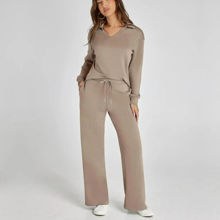 Casual women's two-piece loungewear set. Featuring a V-neck long sleeve top and wide leg pants.