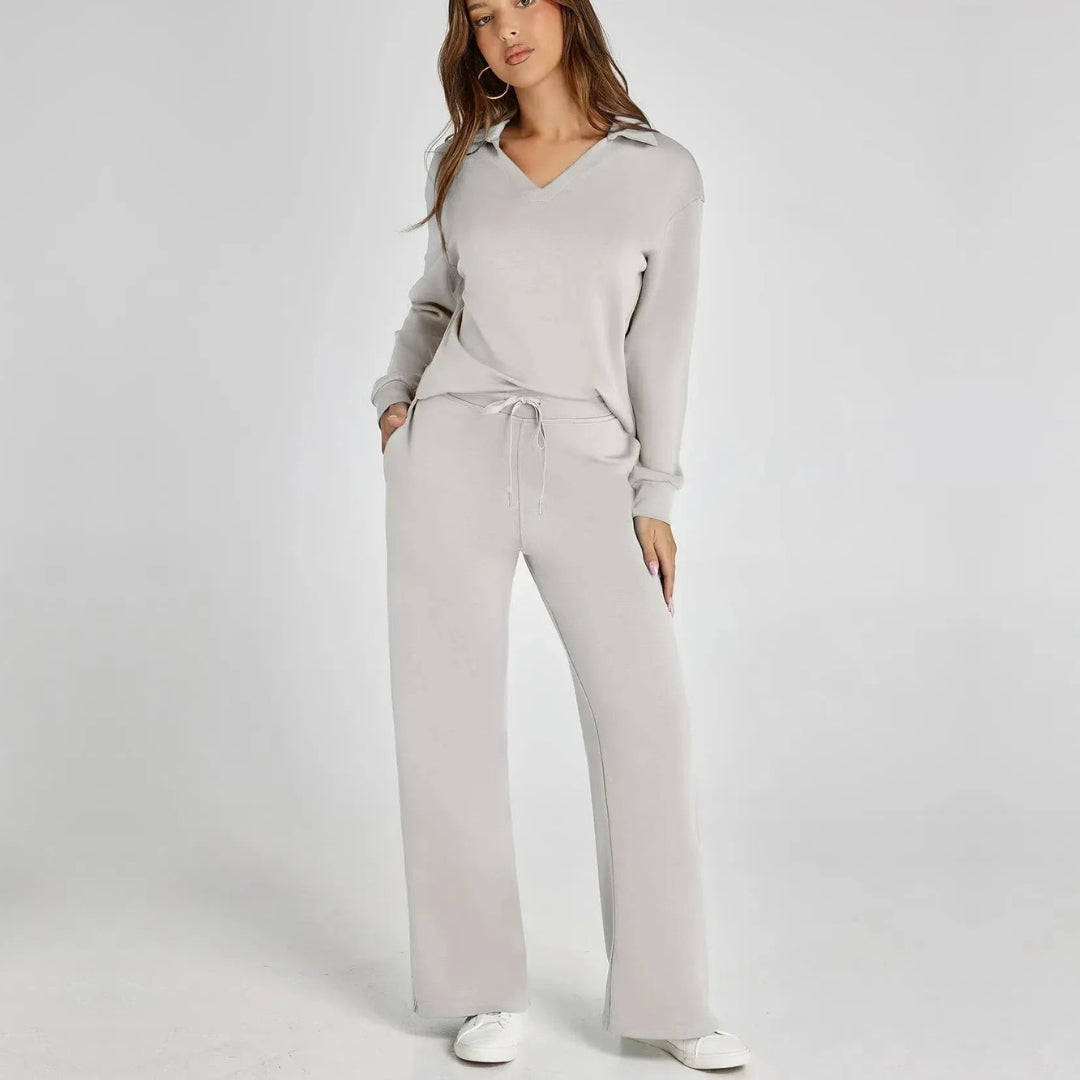 Comfortable women's V-neck long sleeve loungewear set. Chic wide-leg trousers for casual style.