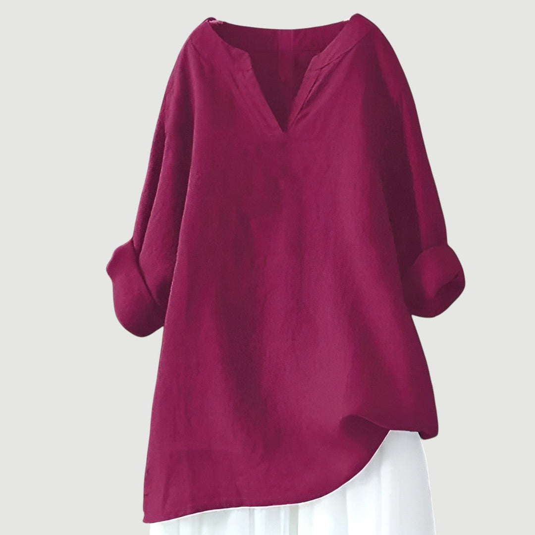 Comfortable linen v-neck tunic for women, featuring a loose fit and long sleeves, ideal for everyday casual style.