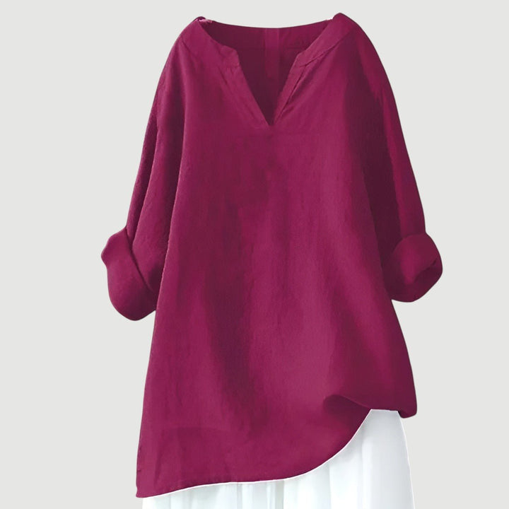 Comfortable linen v-neck tunic for women, featuring a loose fit and long sleeves, ideal for everyday casual style.