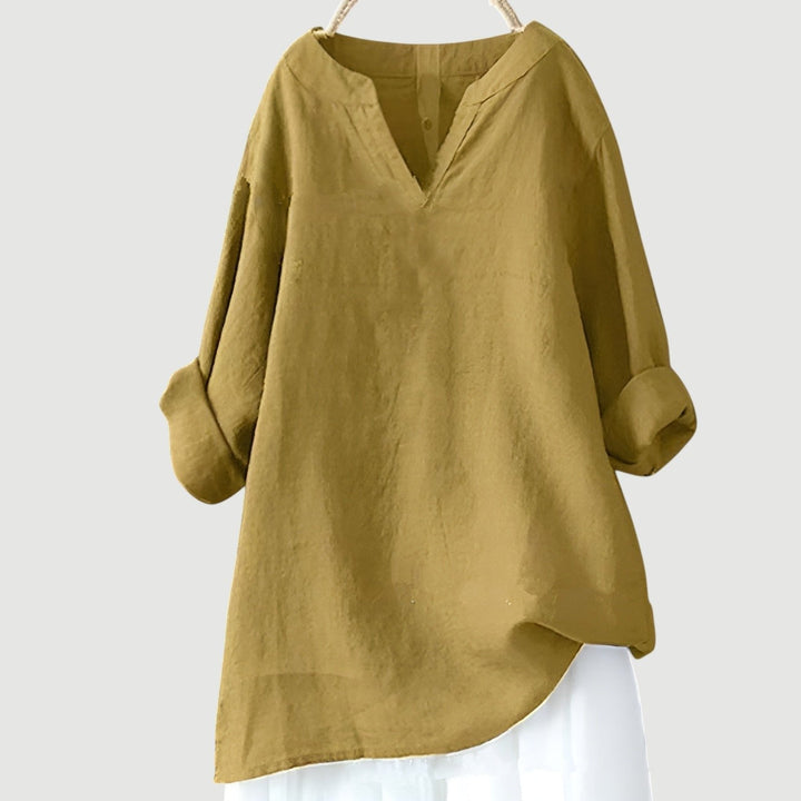 Versatile women's loose fit v-neck tunic. Effortless linen top with long sleeves, perfect for casual summer fashion.