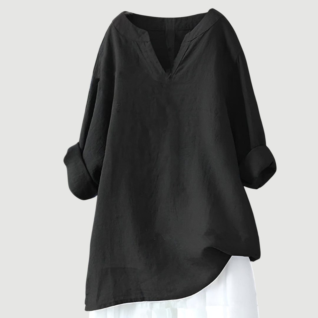 Effortless women's v-neck linen tunic with a loose fit. Comfortable long sleeve top for casual, versatile style.