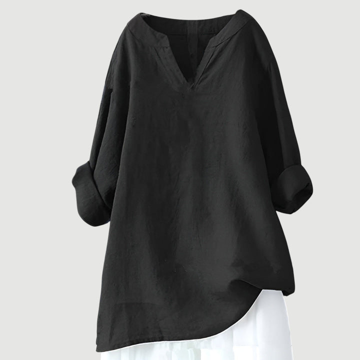 Effortless women's v-neck linen tunic with a loose fit. Comfortable long sleeve top for casual, versatile style.