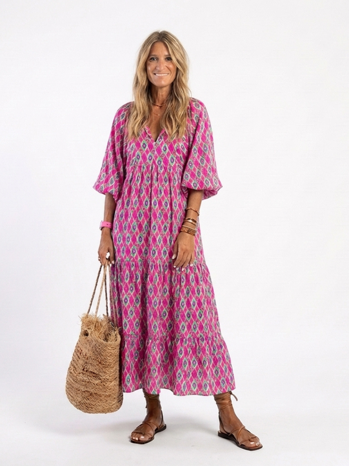Comfortable women's V neck midi dress. Patterned, three-quarter sleeves, flowy for spring & summer casual style.