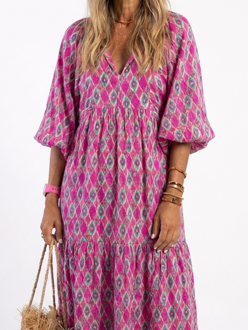 Stylish women's V neck patterned midi dress. Three-quarter sleeves, relaxed fit, perfect for casual spring/summer.