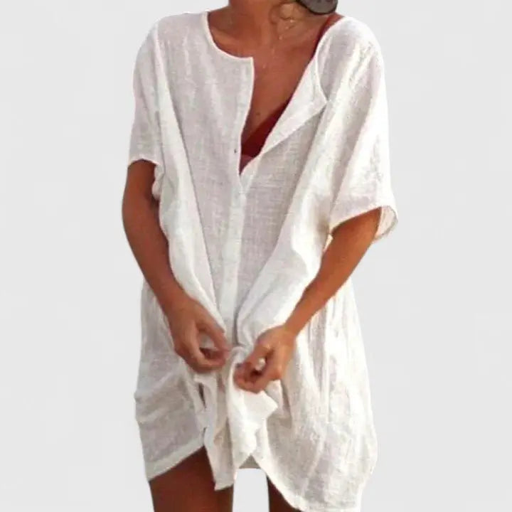 Women's V-neck relaxed fit summer tunic dress, perfect for casual day or beach wear.