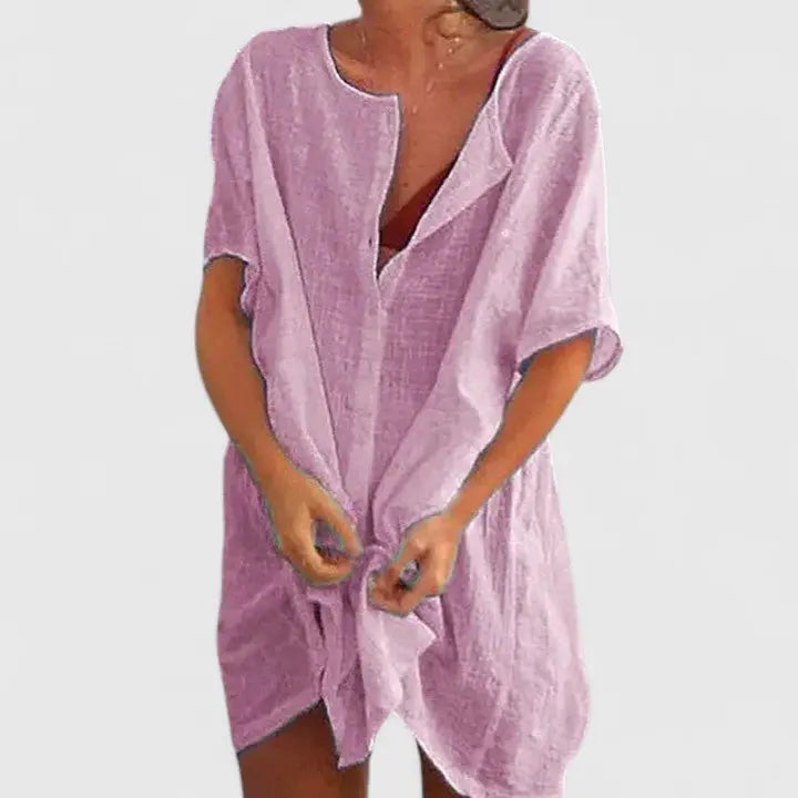 Flowy V-neck tunic dress for women, relaxed fit for ultimate summer comfort & style.