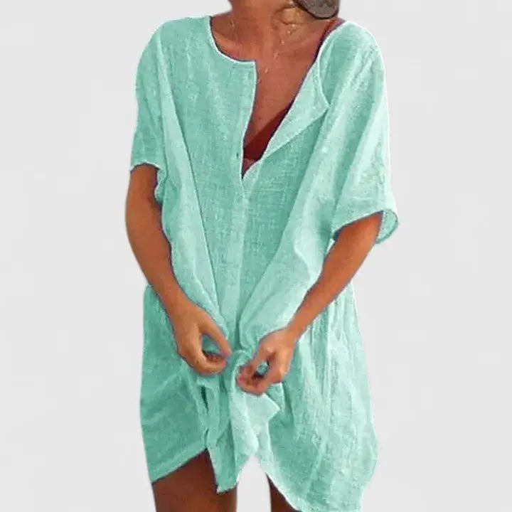 Versatile V-neck relaxed fit summer tunic dress for women, great for day, beach, or resort.