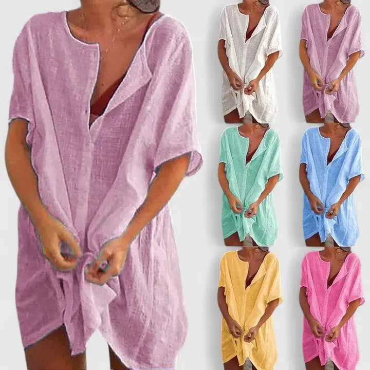 Lightweight women's V-neck summer tunic dress with a relaxed, flowy fit; casual & chic.