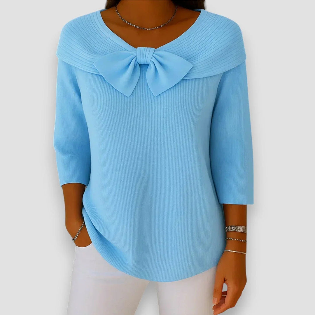 Women's V-neck ribbed knit sweater with elegant bow detail & 3/4 sleeves, perfect for chic casual wear.