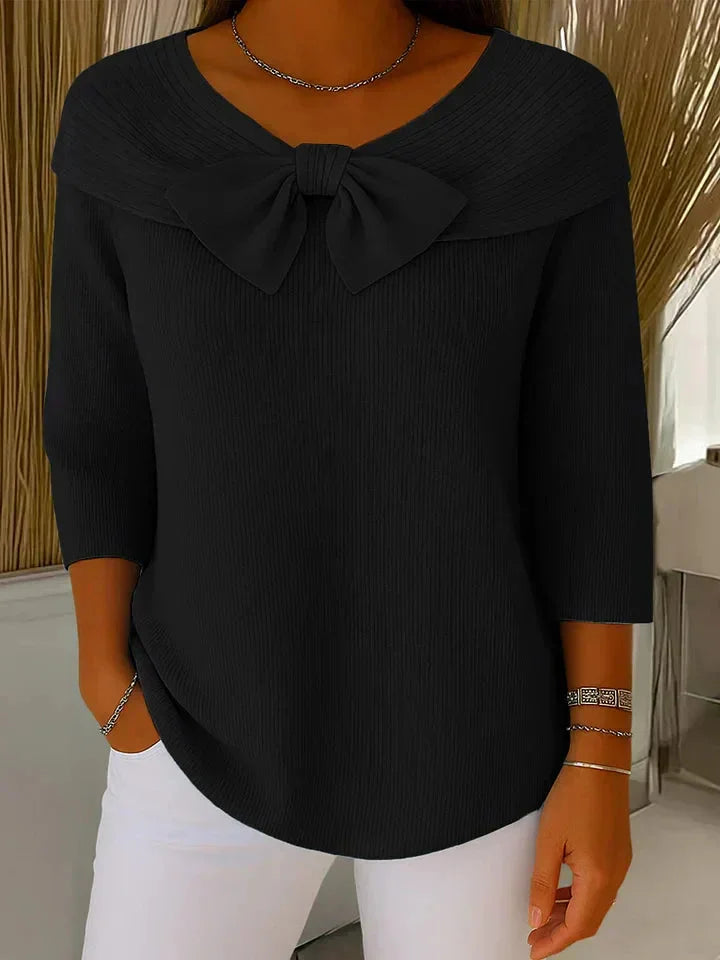 Versatile women's V-neck ribbed knit sweater, 3/4 sleeve & bow, ideal for autumn or spring fashion.