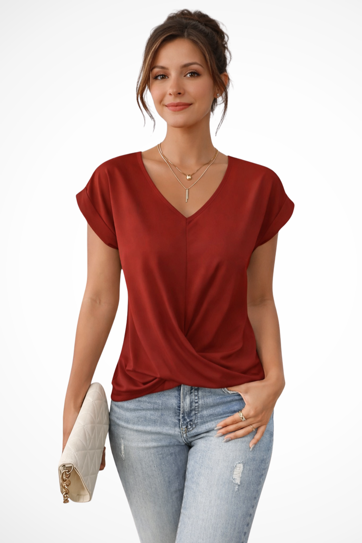 Comfortable women's V-neck short sleeve top, designed with an elegant twist hem for style.