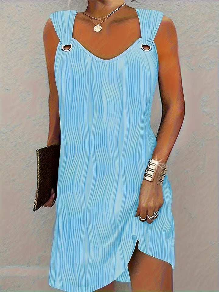 Chic V-neck sleeveless day dress for women. A comfortable, modern casual dress for versatile summer fashion.